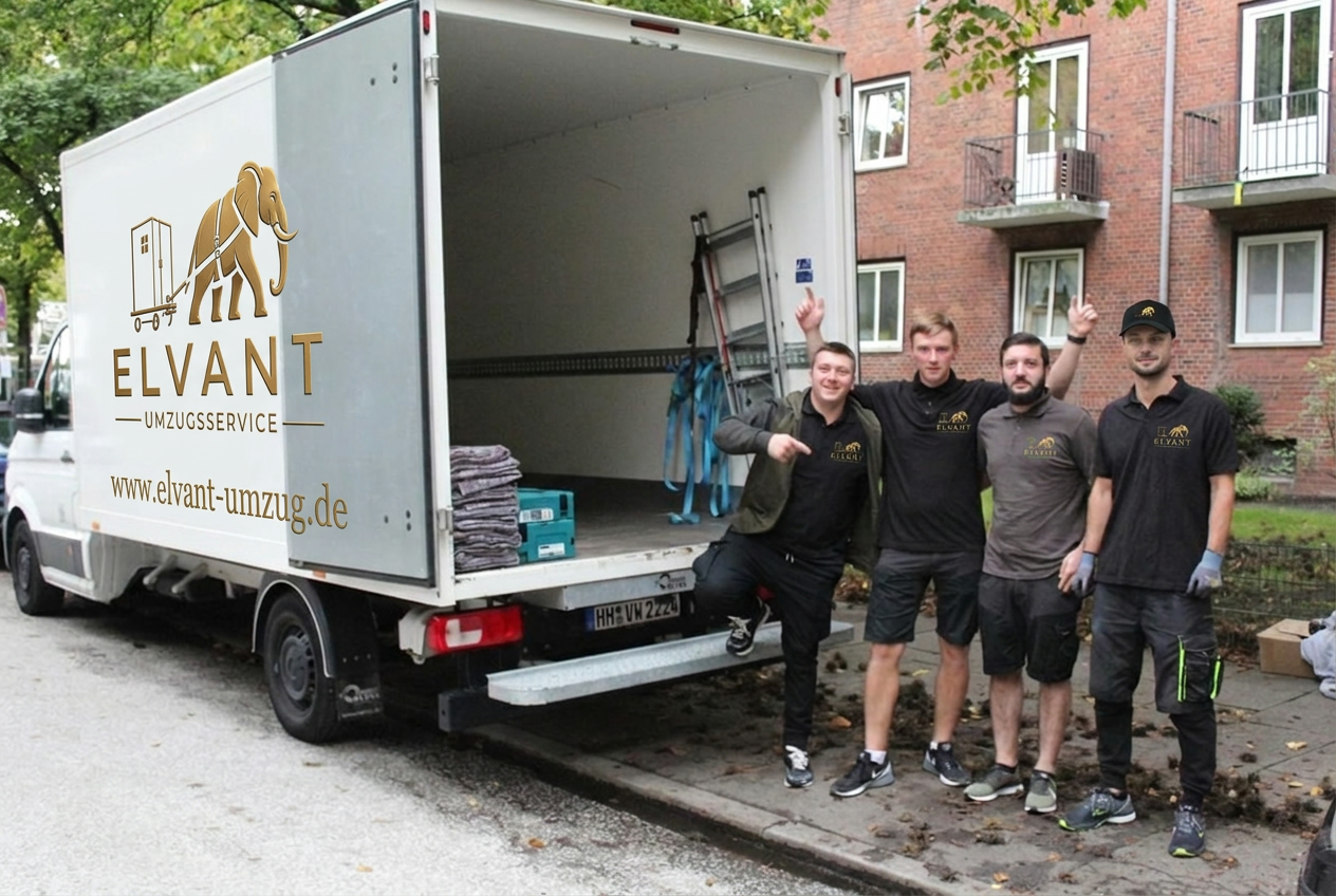 Das Elvant-Umzugsteam steht am Umzugstag vor dem geöffneten Umzugswagen.